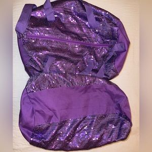 Purple sparkly duffel bag